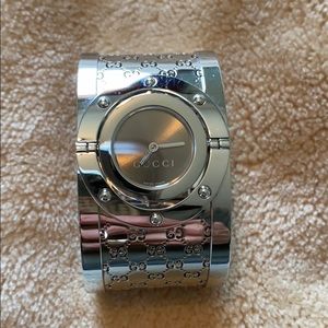 Gucci twirl cuff bangle watch. 34 mm